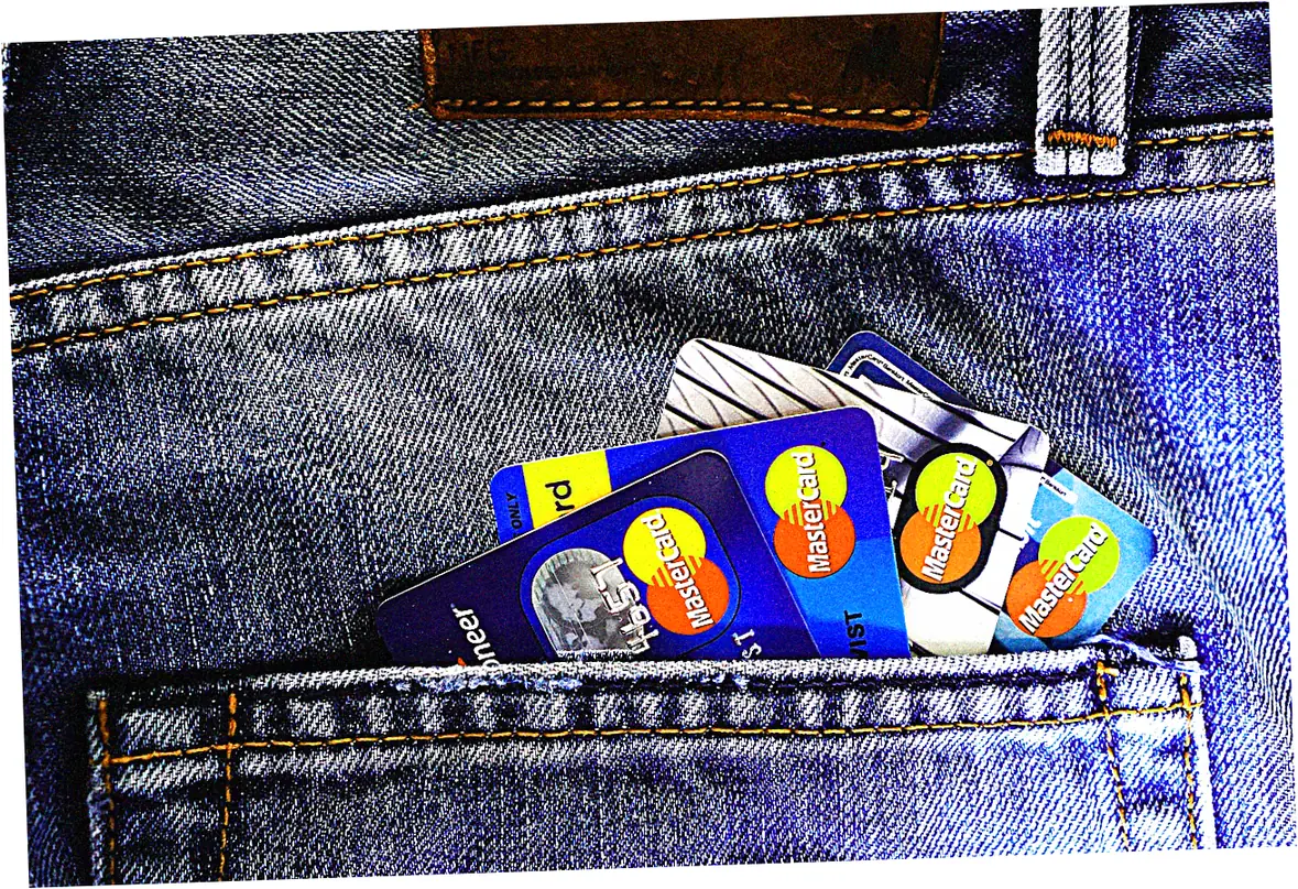 Why is a secured credit card beneficial for building credit?