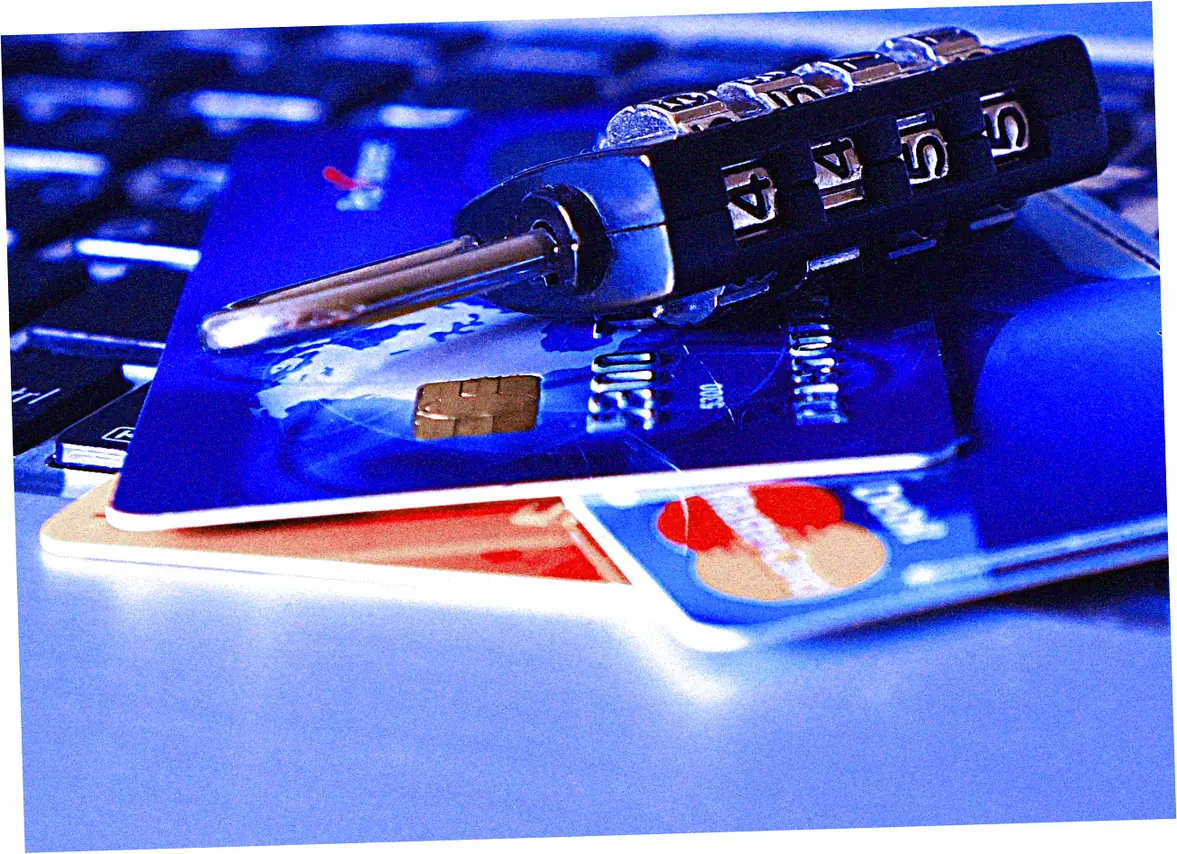 What are the risks of using real credit card numbers for testing?